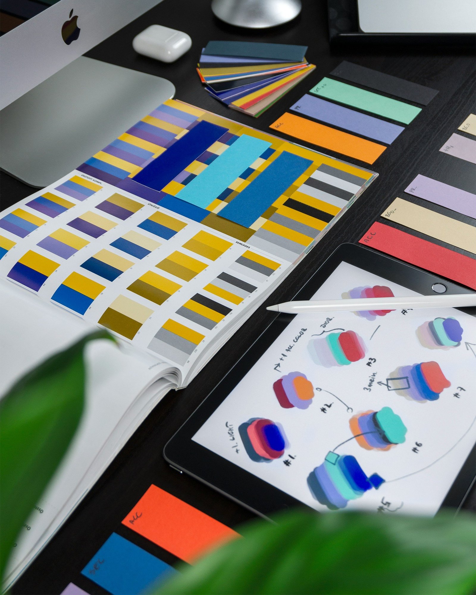 balazs-ketyi-LPWl2pEVGKc-unsplash Creative workspace with a color wheel and computer